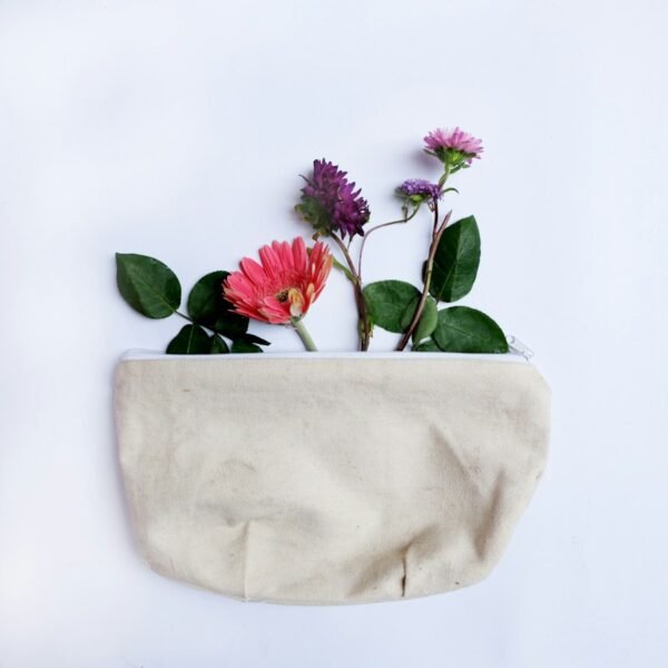 Neutral canvas accessories pouch with floral styling